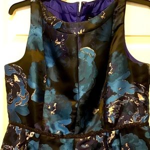 Dressy Black dress with blue flowers.